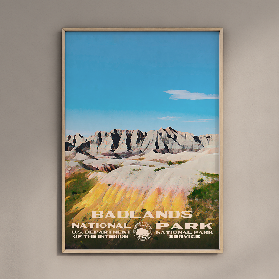 a poster of badlands national park hanging on a wall