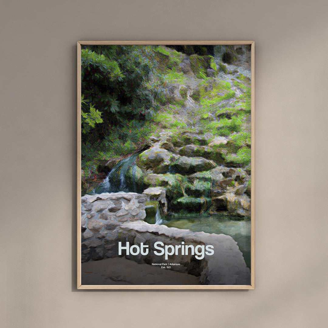 a picture of a hot springs poster hanging on a wall