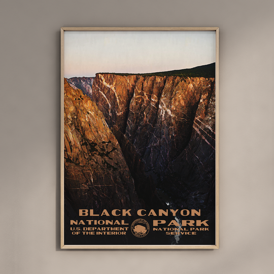 a black canyon national park poster hangs on a wall