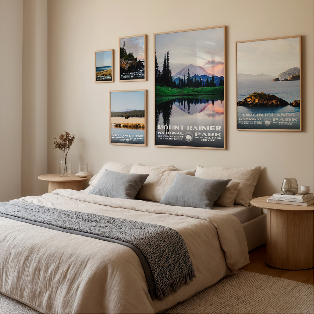 a bedroom with a large bed and posters on the wall