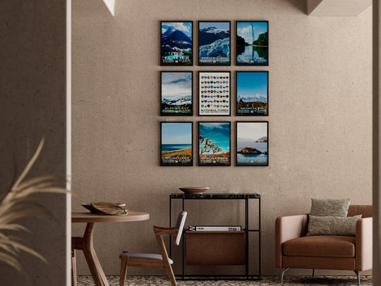 a room with a chair, table and pictures on the wall